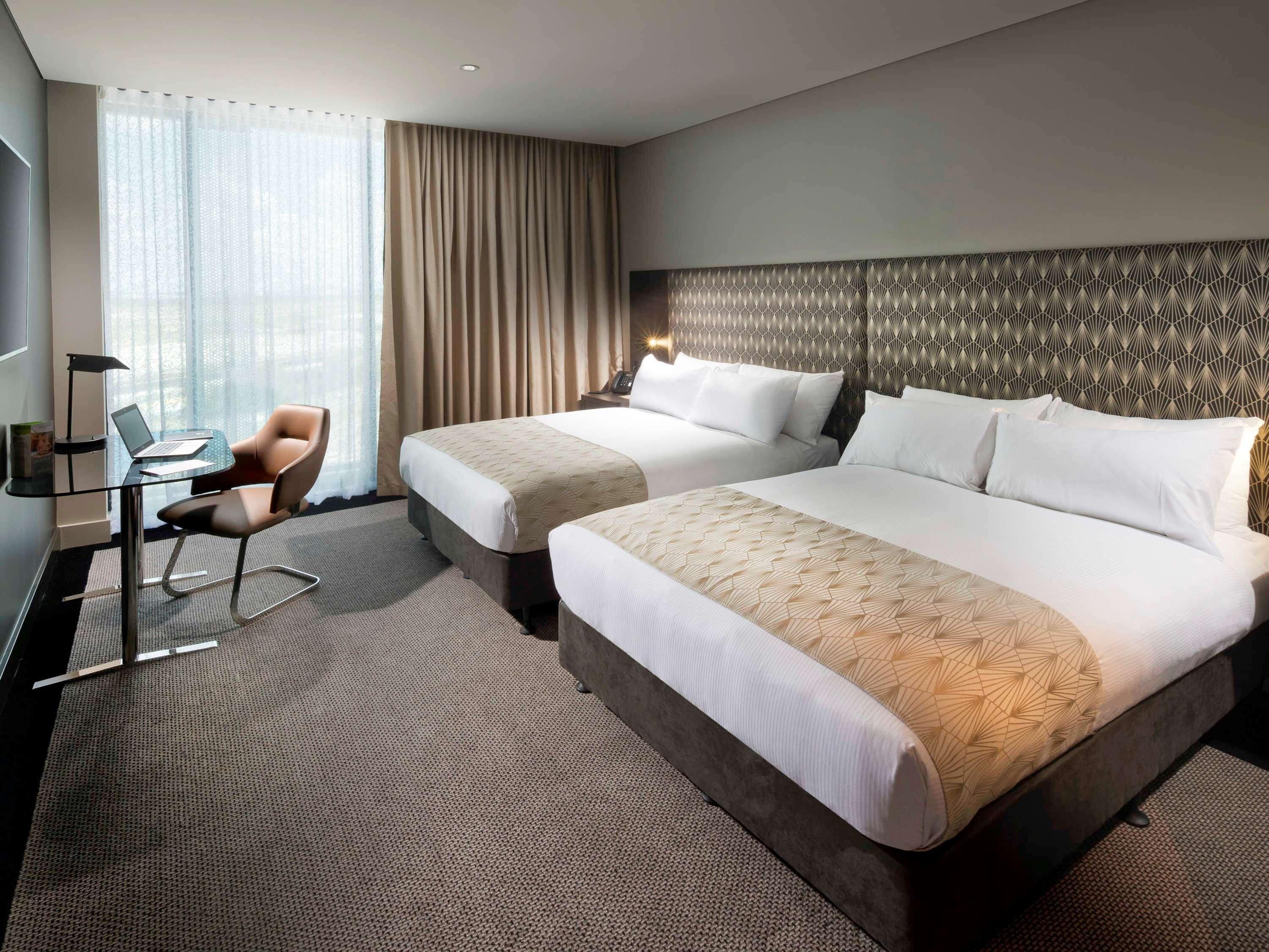 Готель Pullman Brisbane Airport Екстер'єр фото A room at the hotel