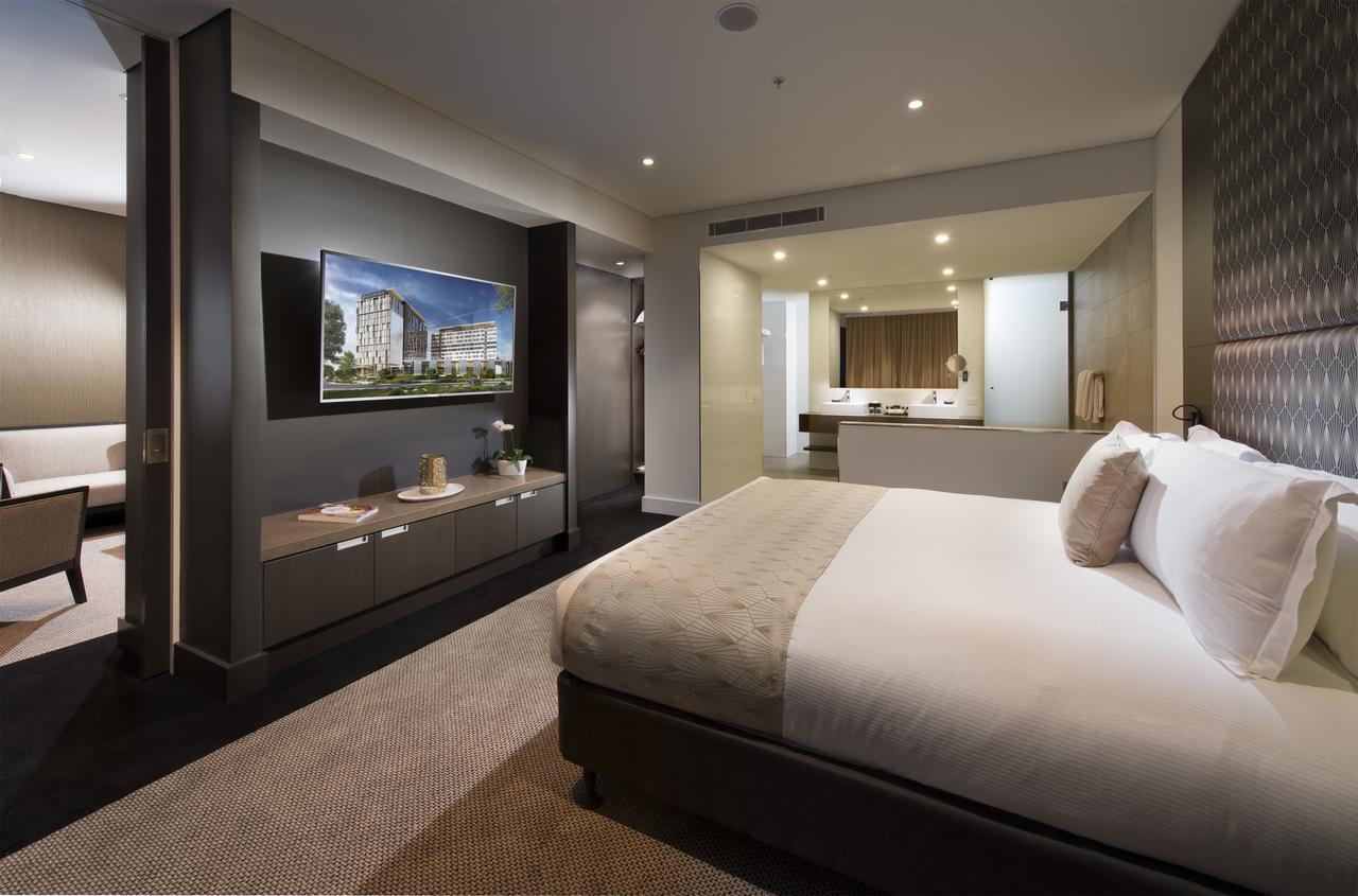Готель Pullman Brisbane Airport Екстер'єр фото A bedroom at the hotel