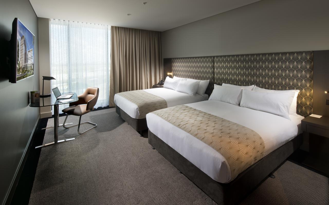 Готель Pullman Brisbane Airport Екстер'єр фото A room at the hotel
