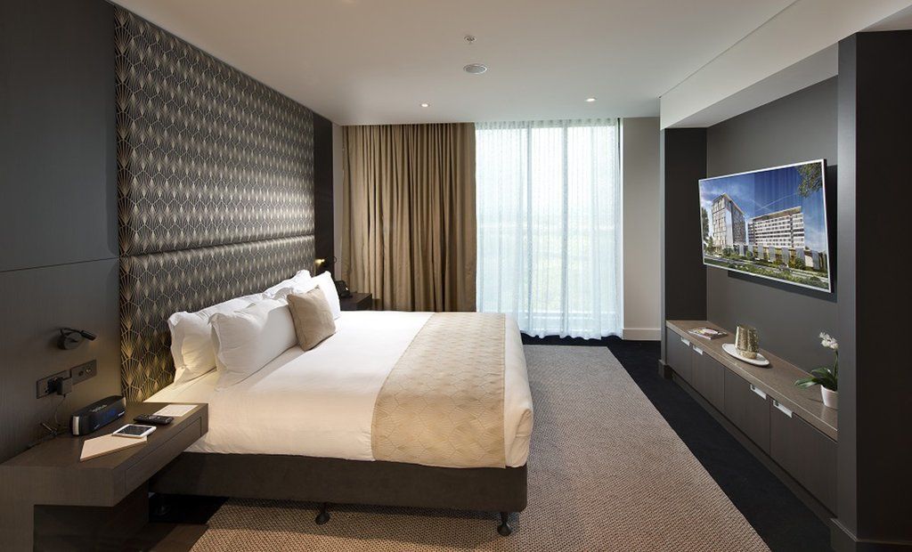 Готель Pullman Brisbane Airport Екстер'єр фото A bedroom at the hotel